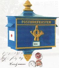 Das Bild zeigt einen alten Briefkasten.