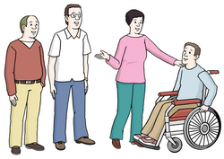 Das Bild zeigt eine Menschengruppe mit einem Rollstuhlfahrer