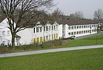Das Bild zeigt die Gesamtschule Bömberg im Gebäude der ehemaligen Hauptschule Wiesengrund.