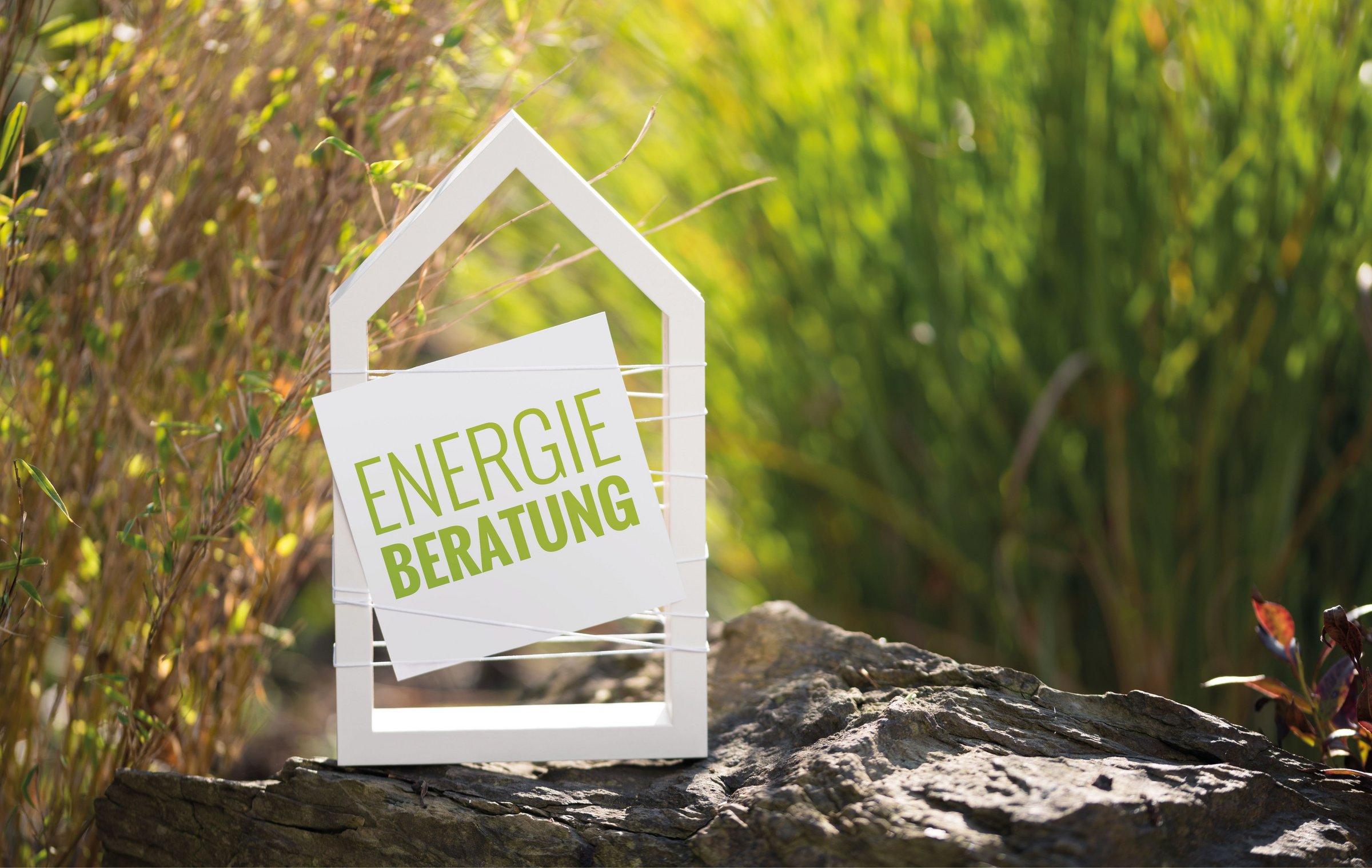 Das Bild zeigt ein Schild mit der Aufschrift "Energieberatung"